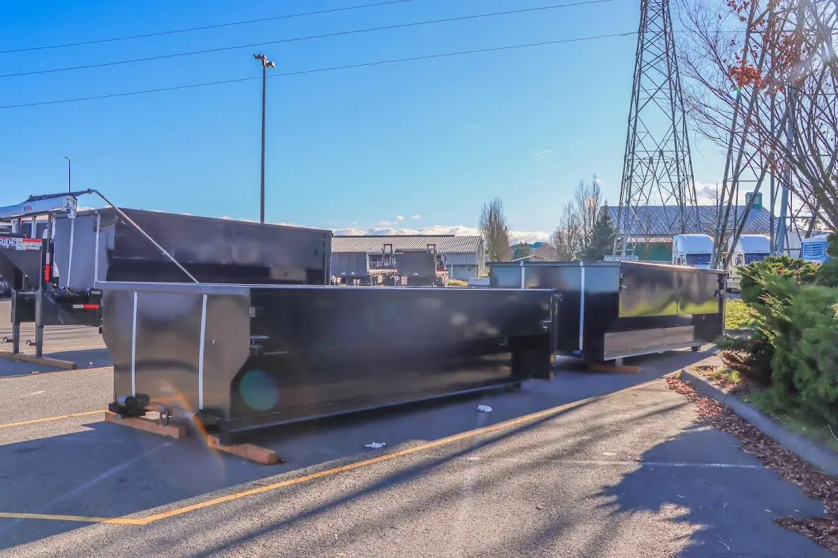 Roll-off dumpster ready for waste disposal at job site for 15 Yard Dumpster Rental in Park